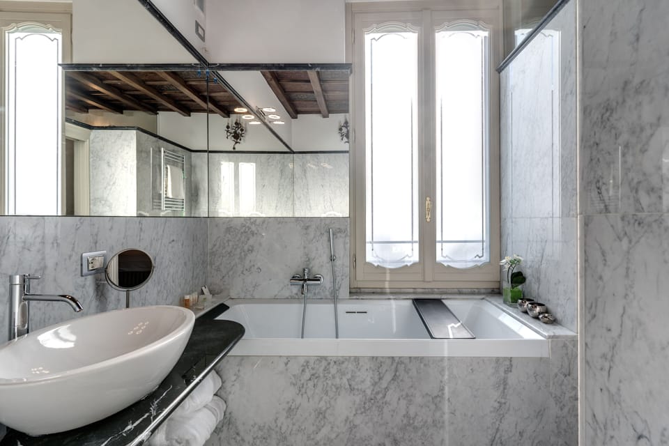 Apartment, Annex Building (via Morigi 8) | Bathroom | Rainfall showerhead, bathrobes, bidet, towels