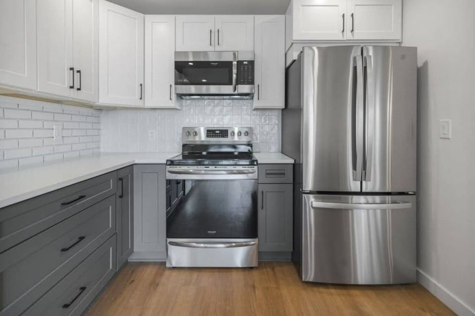 The galley style kitchen offers state of the art appliances and every amenity you will need to cook a unforgettable meal.