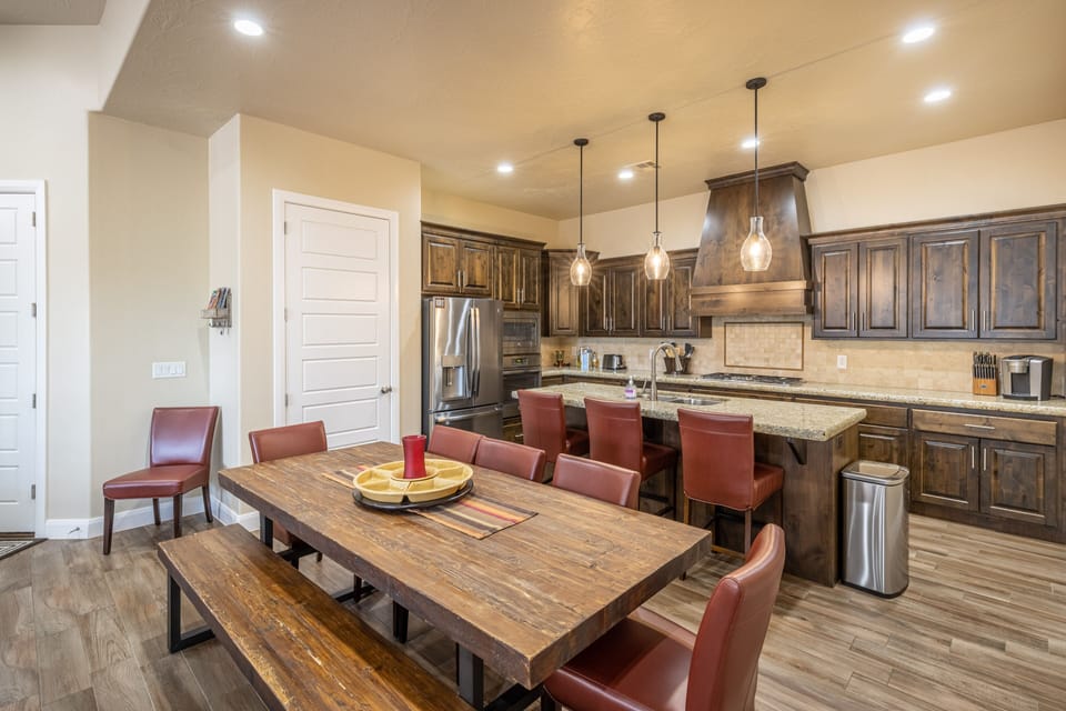 View of Kitchen - The Kitchen is complete with everything you will need for meal preparations including pots, pans, baking dishes, plates, cups, silverware, cutlery, and an assortment of cooking utensils.