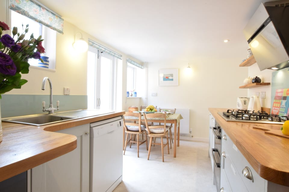 Fridge, dishwasher, cookware/dishes/utensils