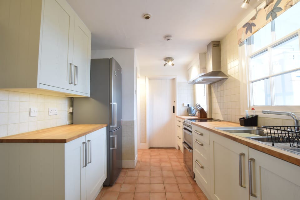Fridge, dishwasher, cookware/dishes/utensils