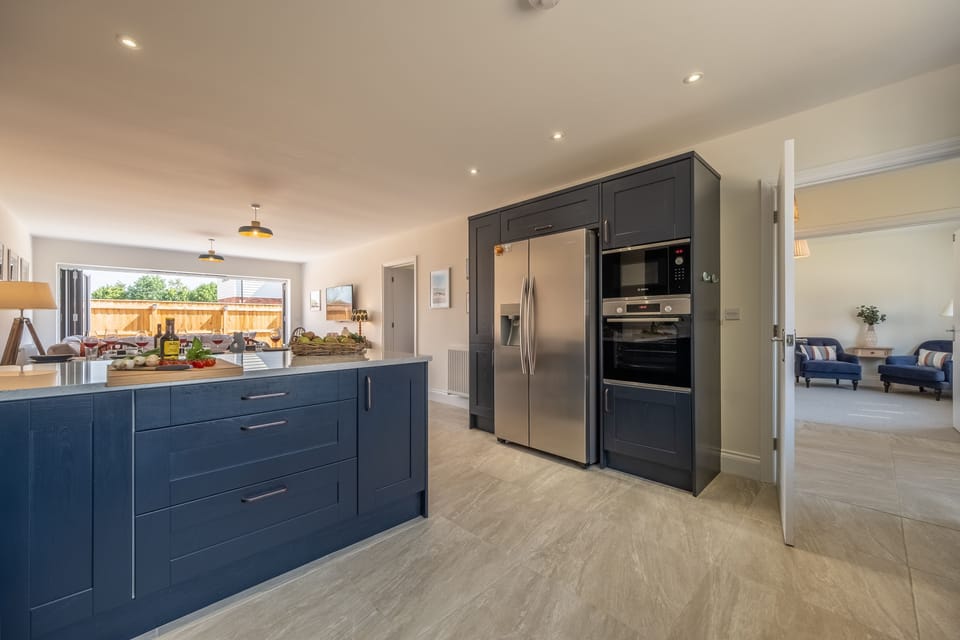 Ground floor: Kitchen with fridge, freezer with water dispenser