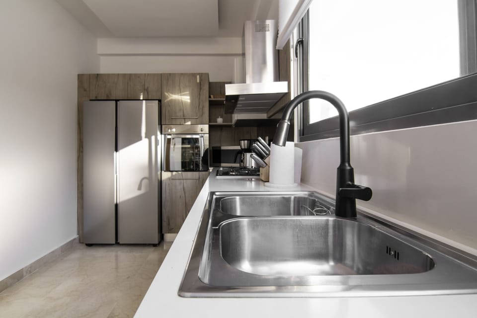Condo, 3 Bedrooms | Private kitchen | Fridge, oven, coffee/tea maker, toaster