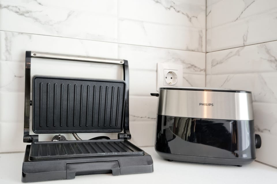 Luxury Apartment | Private kitchen | Full-size fridge, microwave, oven, stovetop