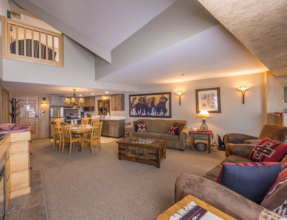 Extra large living area with vaulted ceilings and 2 sleeper sofas