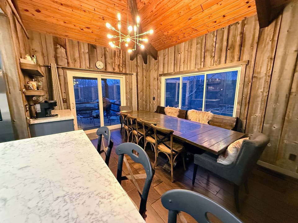 Seating for 10+ at the table and three at the counter