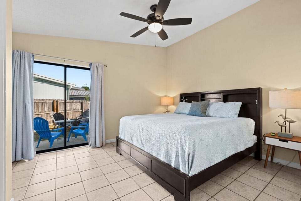 Comfortable King size bed with direct private access to the back yard.