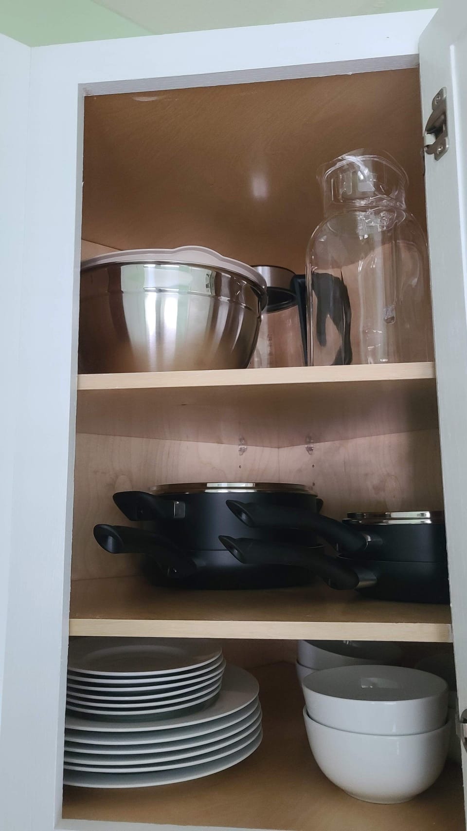 dinner plates, small plates, bowls, pots, pans, plates, mixing bowls, mixing bowls, pitcher and kettle
