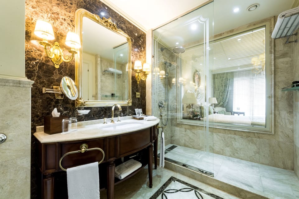 Rainfall showerhead, designer toiletries, hair dryer, bathrobes