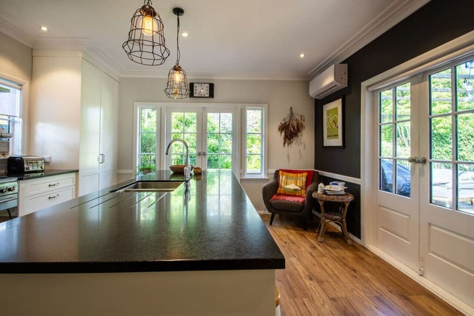 Spacious kitchen area with breakfast bar
