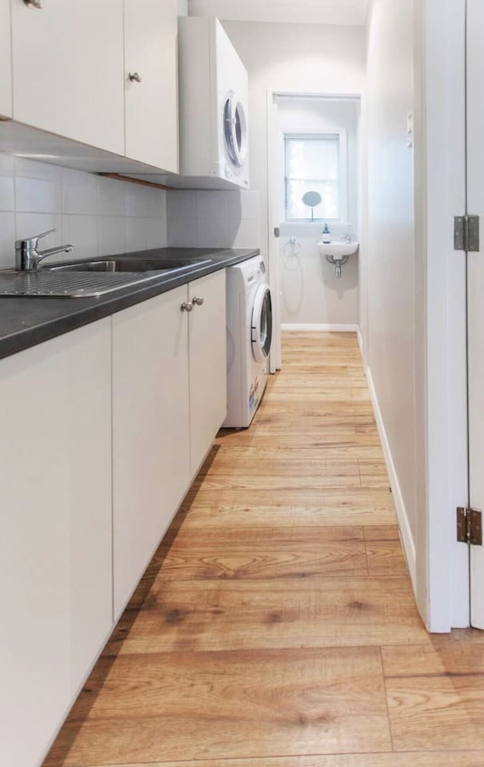 Laundry and an additional toilet/basin
