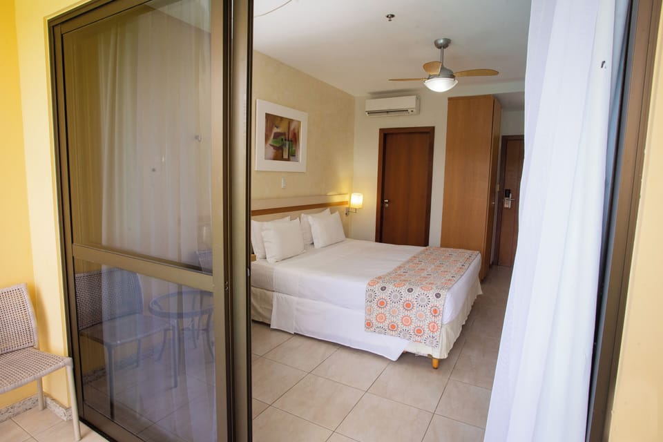 Apartamento Executivo | In-room safe, bed sheets