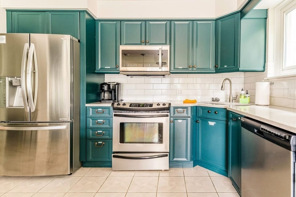 Fully stocked kitchen with dual k-cup and drip Keurig coffee maker. 
