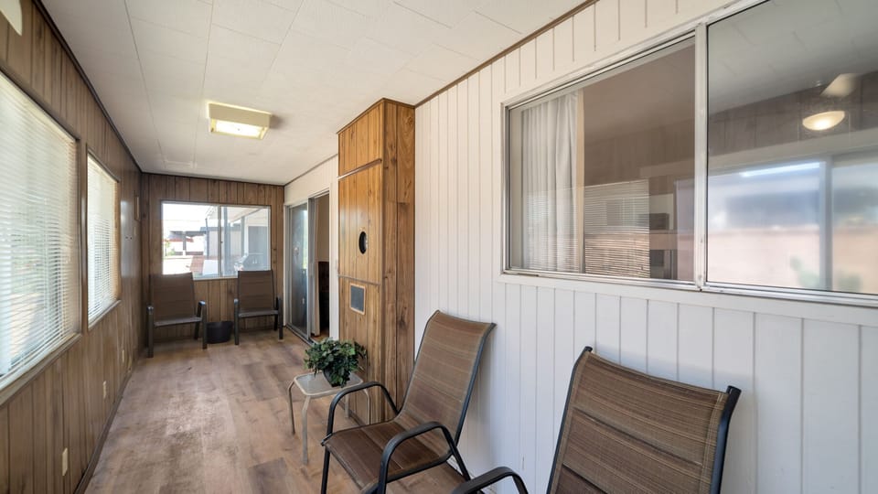 Enclosed back patio. Additional space to enjoy and make your own.