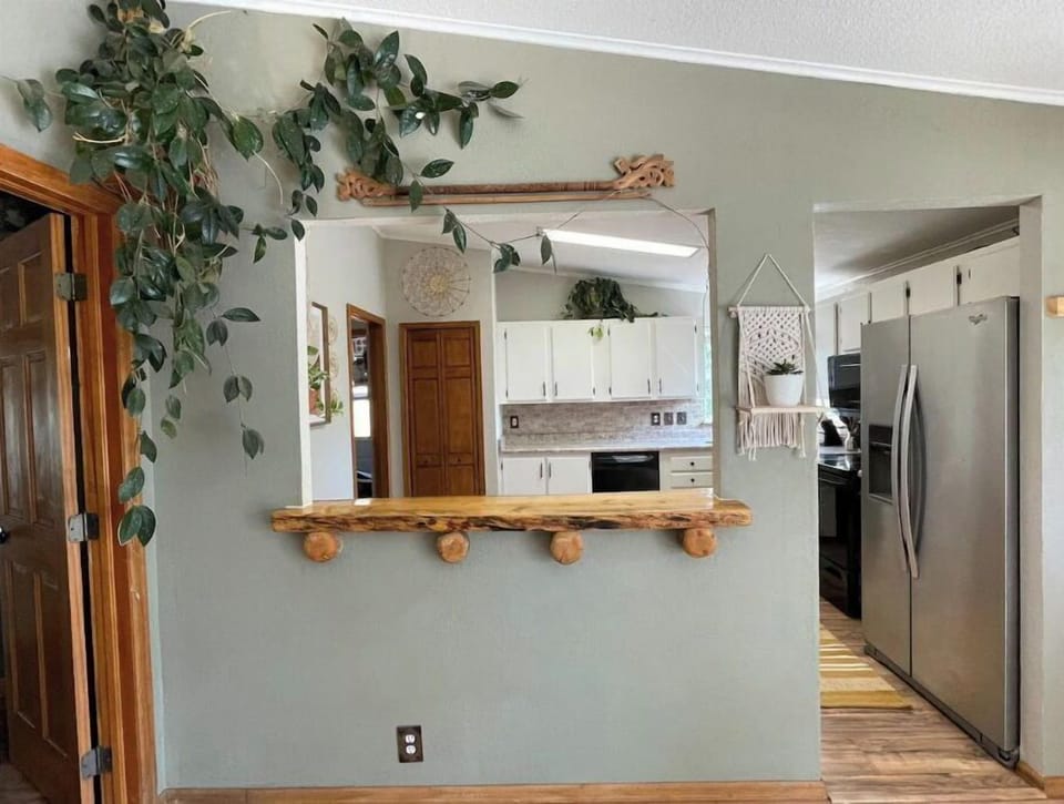 Breakfast bar from living space into kitchen. 