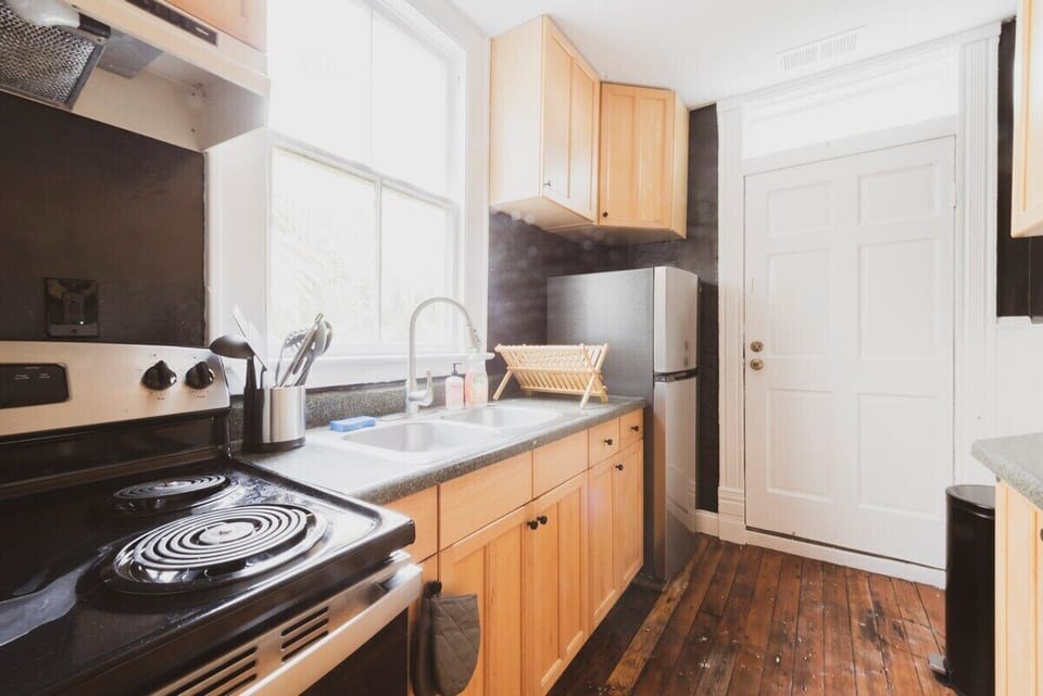 The first floor kitchen is outfitted with basic essentials