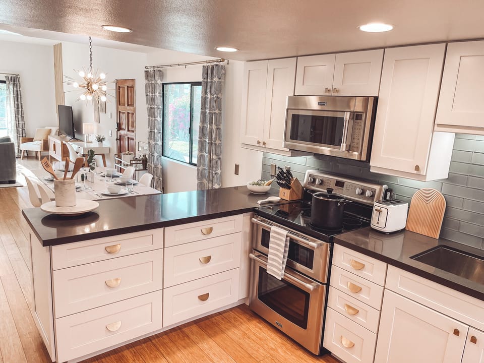Completely updated kitchen, wood cabinets, granite counter, and new appliances
