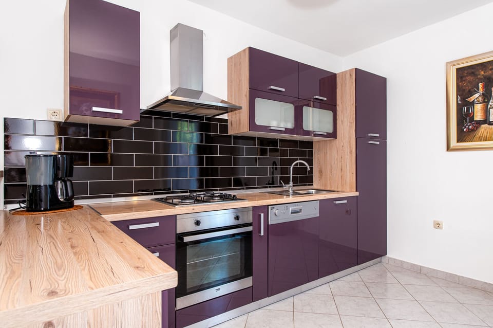 Villa | Private kitchen | Fridge, oven, stovetop, dishwasher