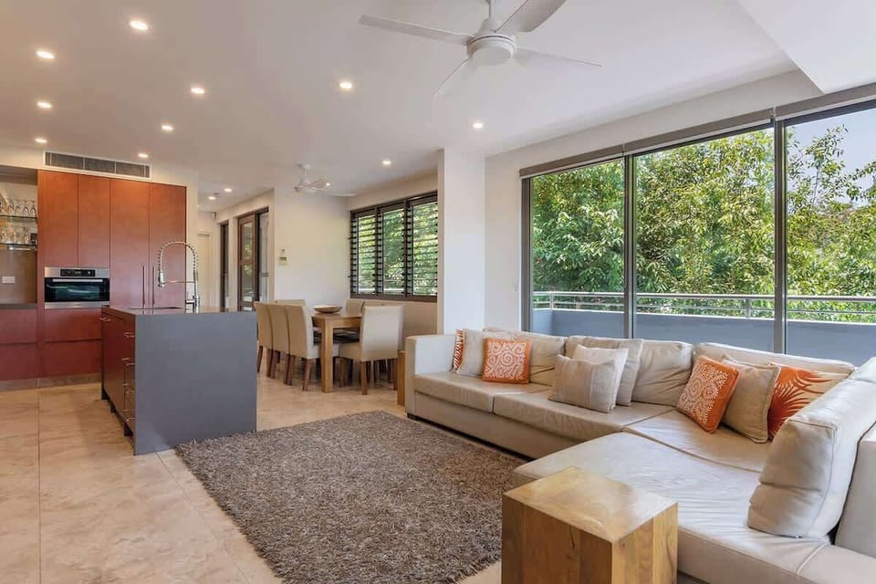 Open plan living is great for entertaining, with ceiling fans and A/C to keep temperatures comfortable. 
