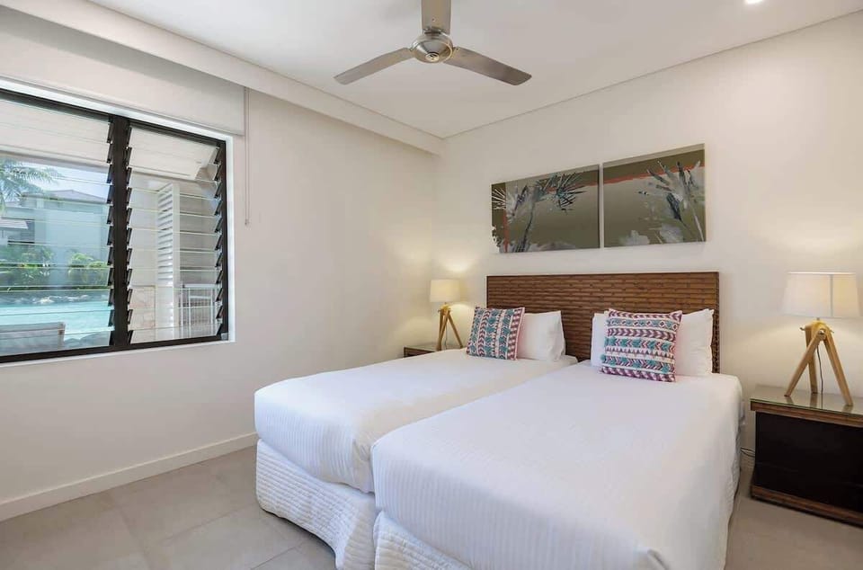 Ideal for both adults and children, the third bedroom offers two comfortable single beds which can be pushed together to create a king bed upon request.