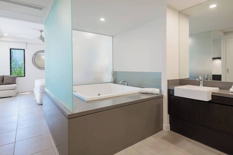 Indulge in relaxation and serenity with a jetted spa bath calling your name in the primary bedroom.