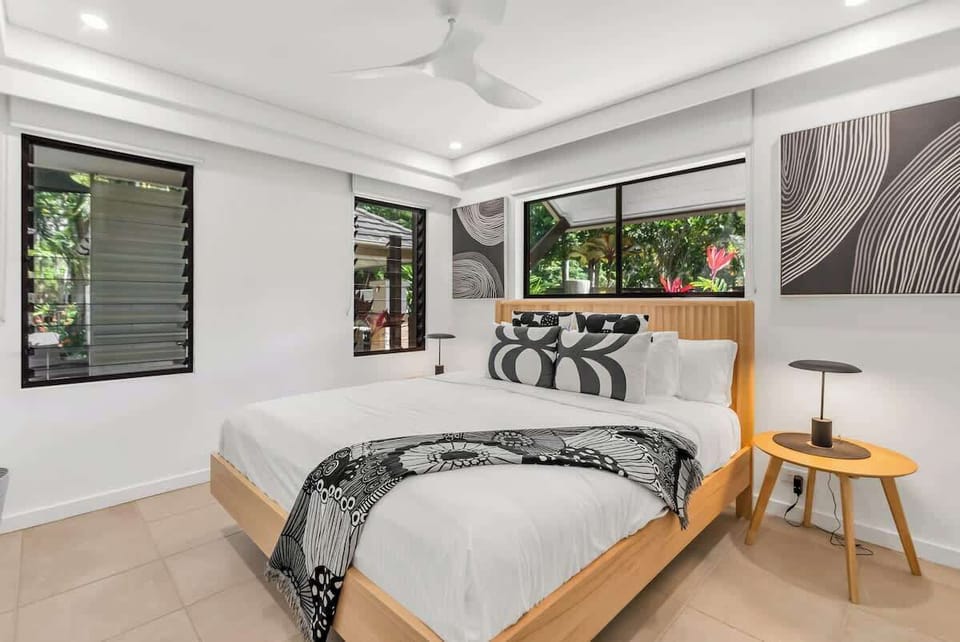 The first bedroom is a modern respite with a king-sized bed that can be split into two singles upon request. There are also built-in robes for your belongings and an attached ensuite.