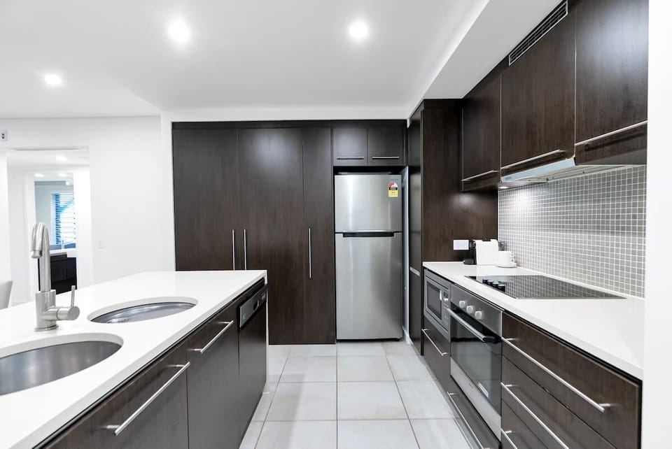 The well-equipped gourmet kitchen is ready for your holiday catering with modern appliances at your disposal.