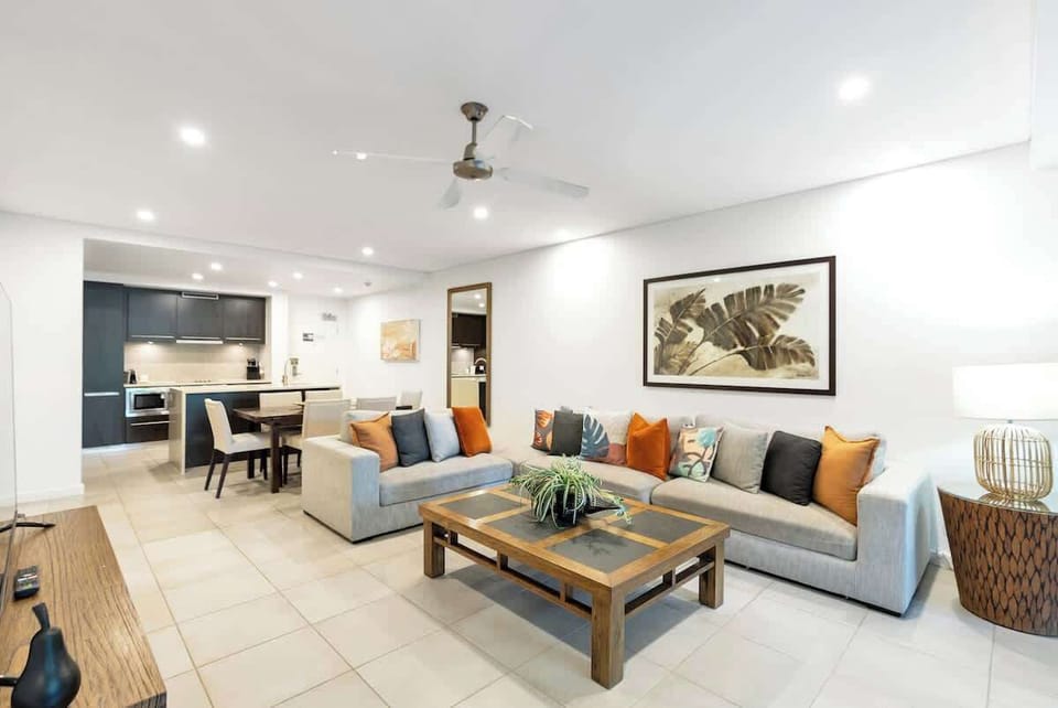 Experience seamless flow and effortless comfort in the open-plan living area, connecting the kitchen, dining area, and balcony for a harmonious living experience.