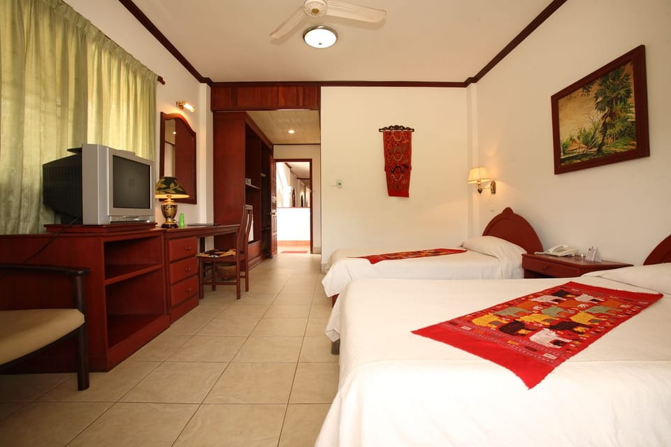 Standard Twin Room | Minibar, in-room safe, rollaway beds, free WiFi