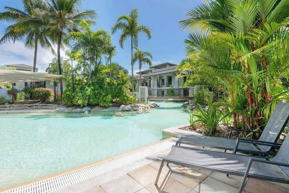 Unwind on cosy sun loungers by the pool.