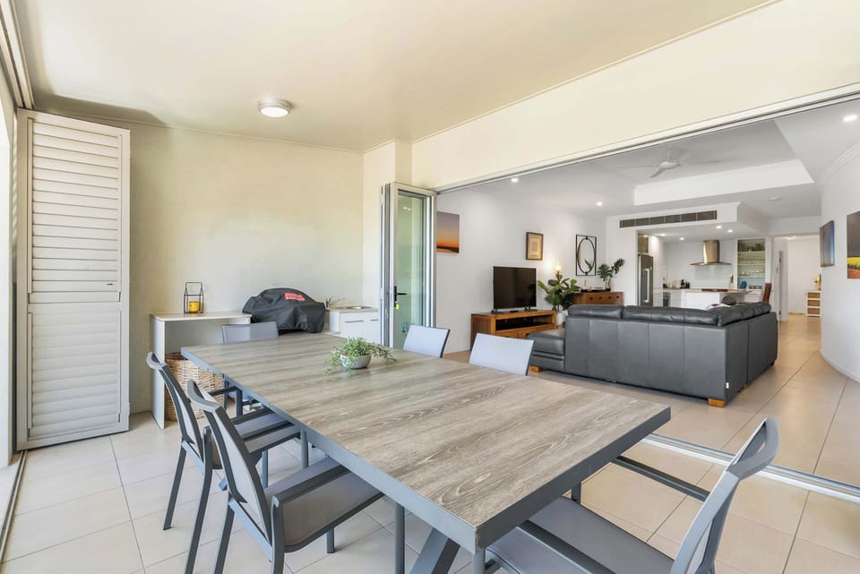 The living area extends to a private balcony where you can dine alfresco with the group to the sound of crashing waves.