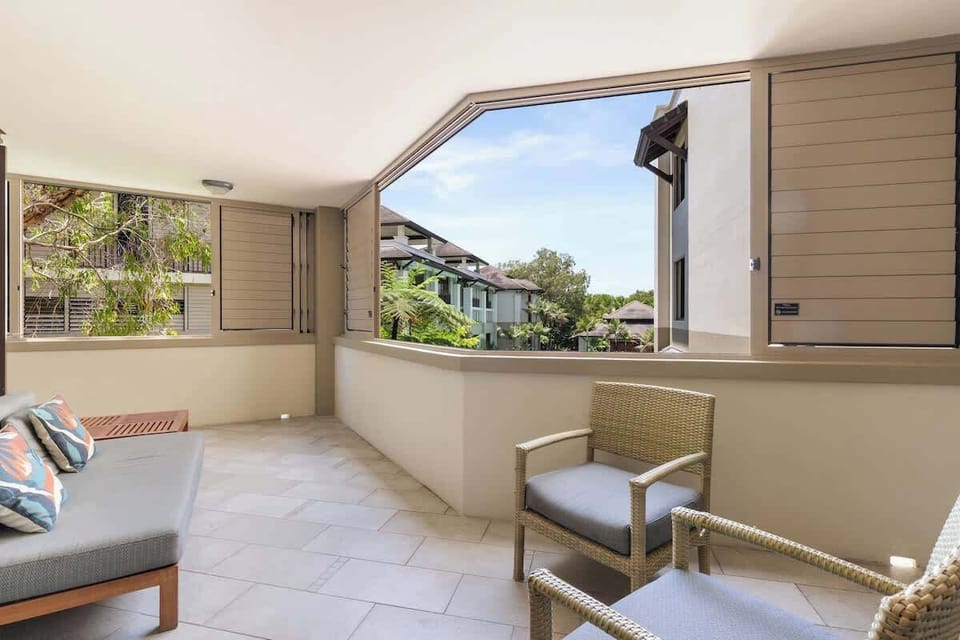 Soak up the tropical surrounds from the covered balcony, ideal for morning coffee or evening drinks in the open air.