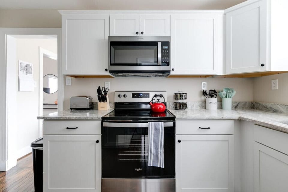 Fully equipped with all the essentials, including a microwave, dishwasher, Keurig Duo coffee maker, and funky coffee cups. Plenty of counter space and cozy charm make cooking a delight!