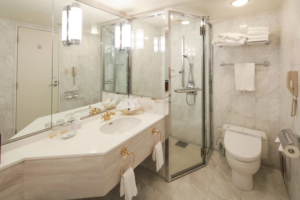 Executive Twin Room, Smoking | Bathroom | Bathtub, deep soaking tub, rainfall showerhead, free toiletries