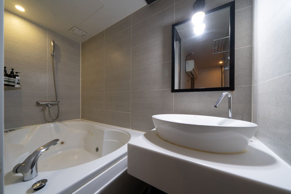 Premium Double Room | Bathroom | Separate tub and shower, free toiletries, hair dryer, bathrobes