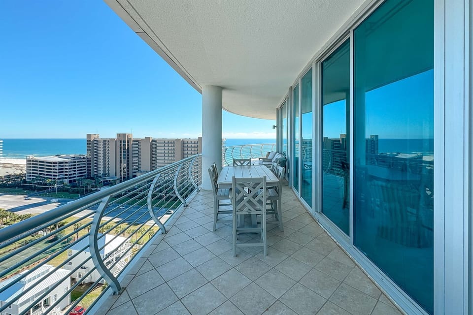 Unwind on this expansive balcony and soak in panoramic water views. A perfect retreat for relaxation and enjoying the coastal breeze.