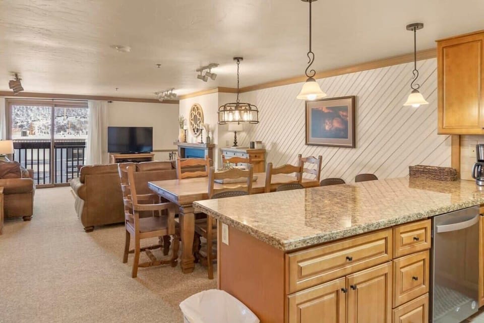 The well-decorated open-concept living space is outfitted with a focus on comfort so your group can fully relax and enjoy the comforts of home on your mountain vacation.
