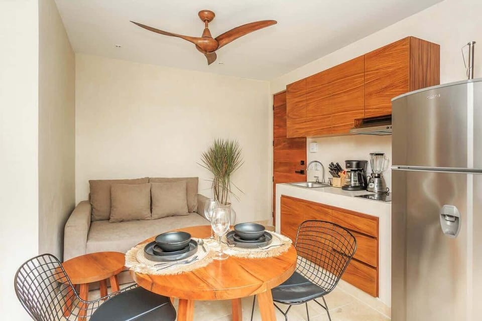 Cute cozy kitchen area w/ sitting room sofa.