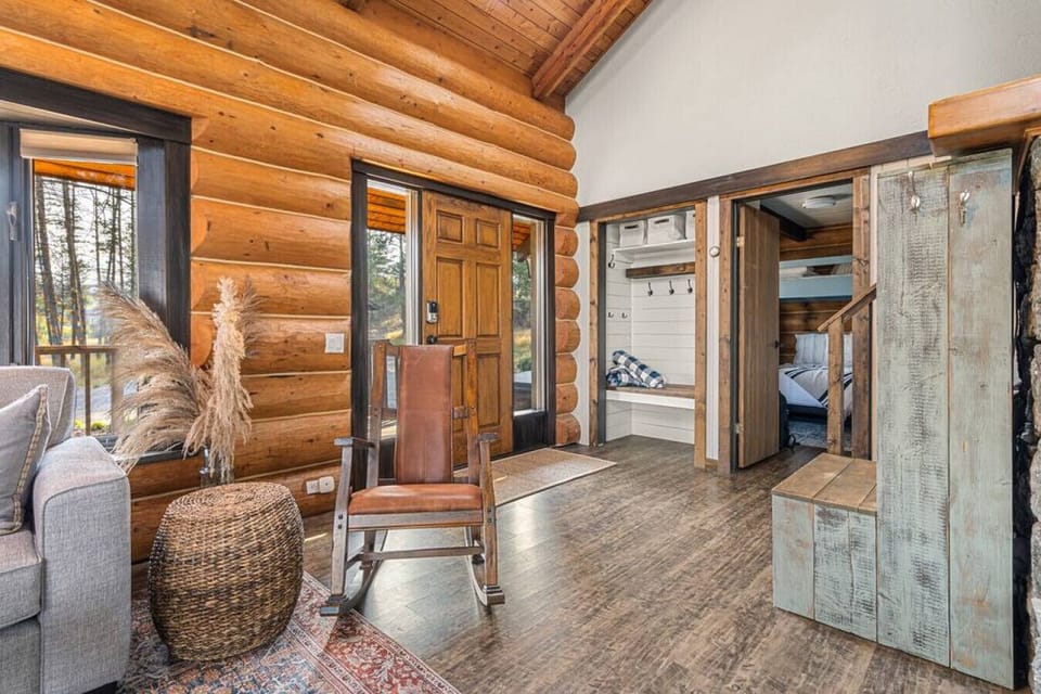 The home`s entry is spacious and grand, with lots of space for shoes, boots, and coats to be put away.