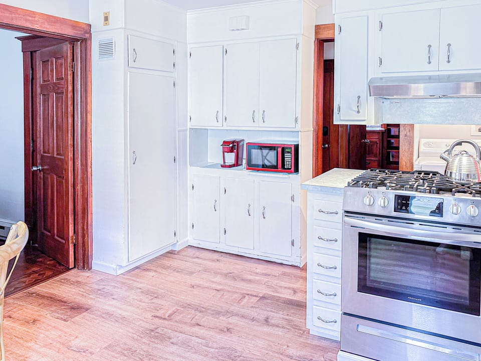 Enjoy preparing meals in a spacious kitchen that boasts extensive counter space.