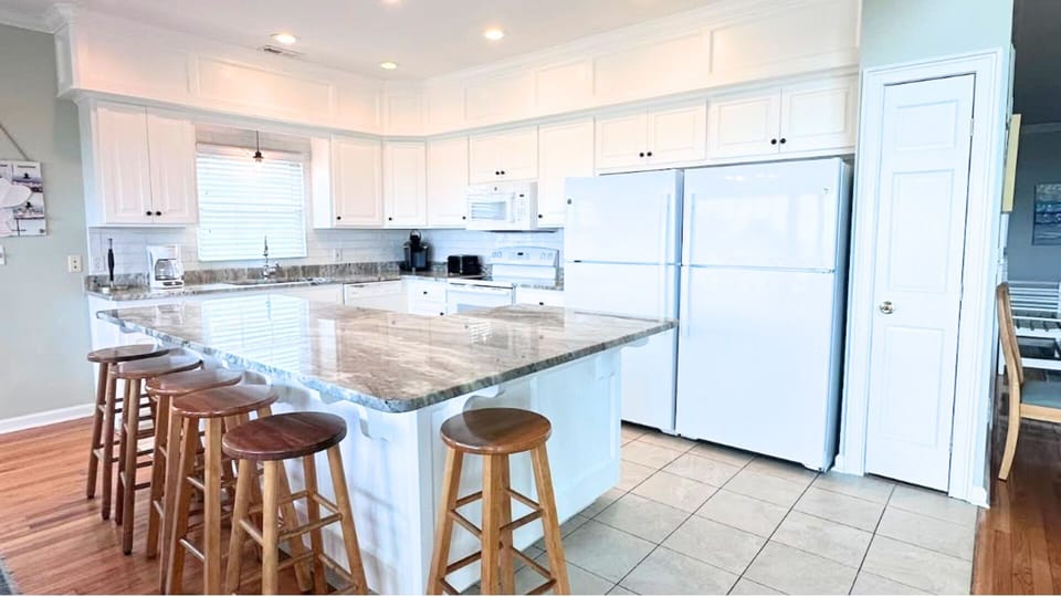 Kitchen and dining area made for shared meals and easy prep
