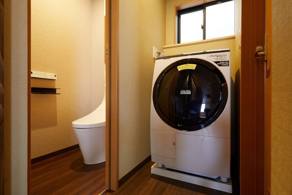 Equipped with an AI automatic detergent loading washing machine with clothes drying function.