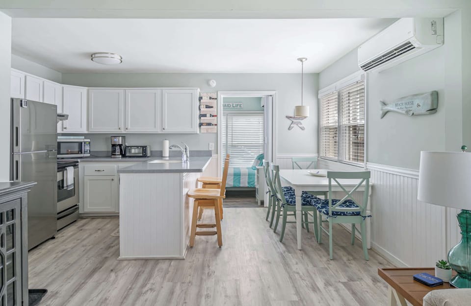 Condo, Multiple Beds, Kitchen (Coastal Condo) | Private kitchen | Fridge, microwave, oven, stovetop