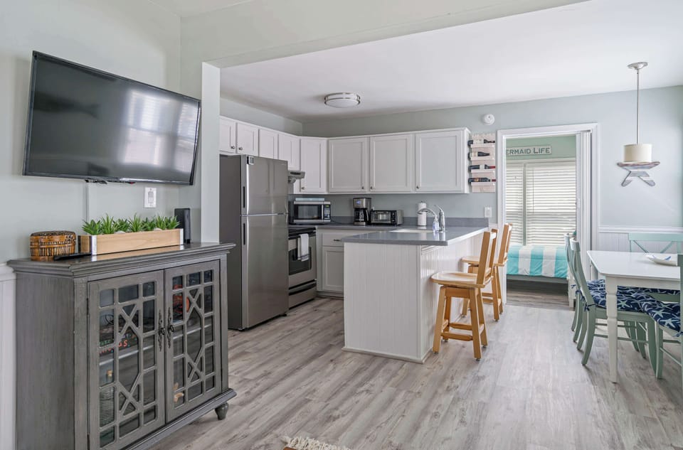 Condo, Multiple Beds, Kitchen (Coastal Condo) | Private kitchen | Fridge, microwave, oven, stovetop