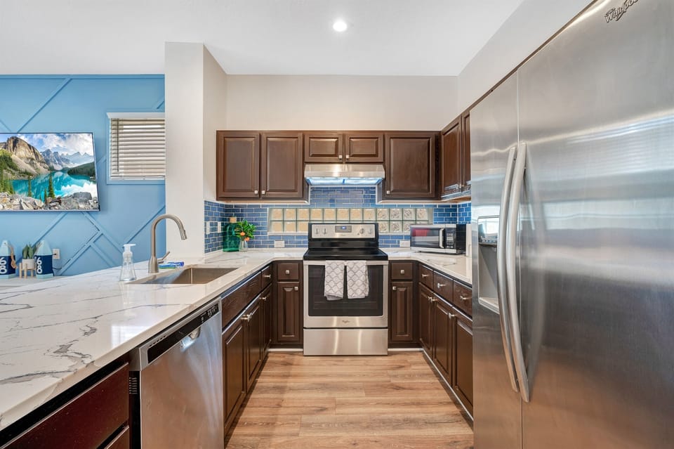 Crafting memories, one dish at a time! Our updated kitchen sets the stage for family bonding and culinary adventures. Creating cherished moments has never been more delightful.