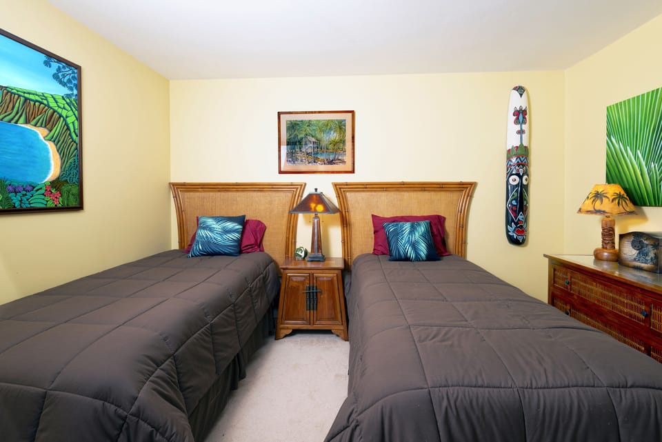 Comfortable twin beds. Welcoming second bedroom with modern touches and easy access to the second full bathroom, perfect for families or friends.