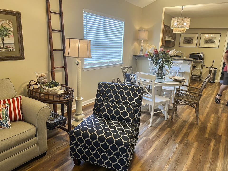 Living room area connected to dining area