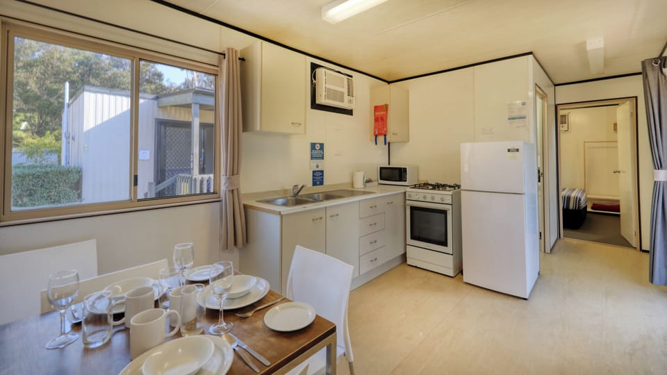 Redpoint Villa - 4 Berth - No Pets Allowed budget cabin | Private kitchen | Full-size fridge, microwave, stovetop, toaster