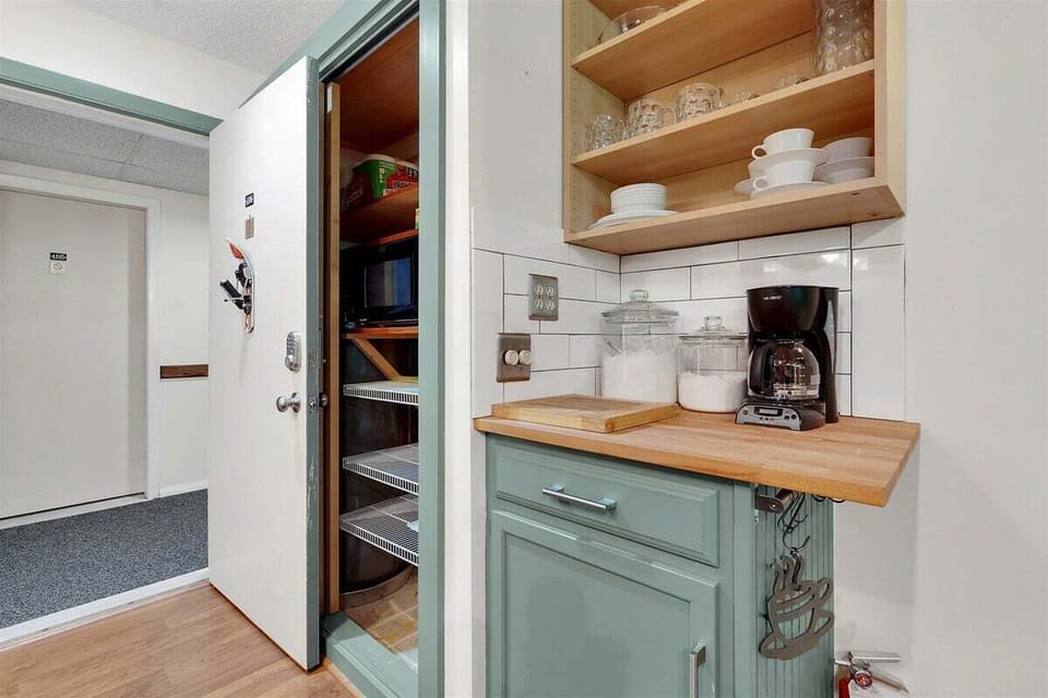Unit entryway with closet and coffee bar