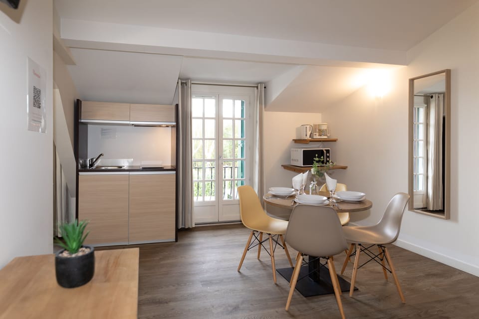 Superior Apartment, 1 Bedroom | Living area | 80-cm flat-screen TV with digital channels, TV
